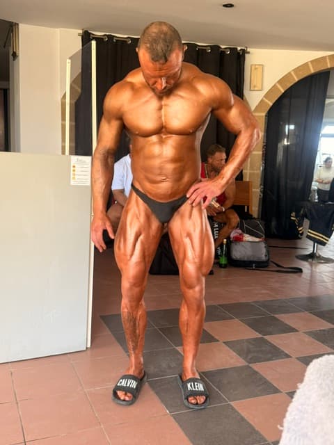 Backstage — poza nóg przed zawodami